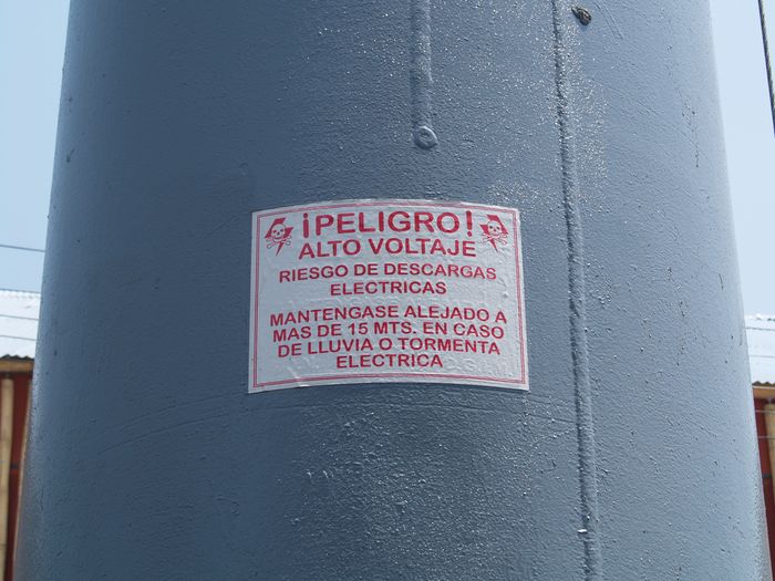 Sign on the flagpole of the Zocalo